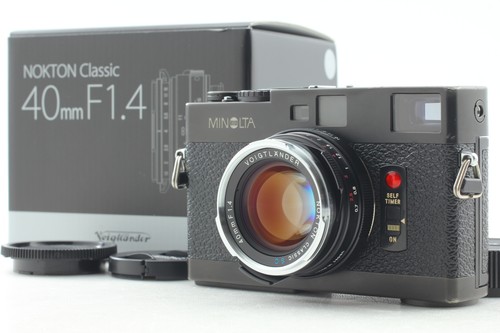 New lens near mint minolta - new,